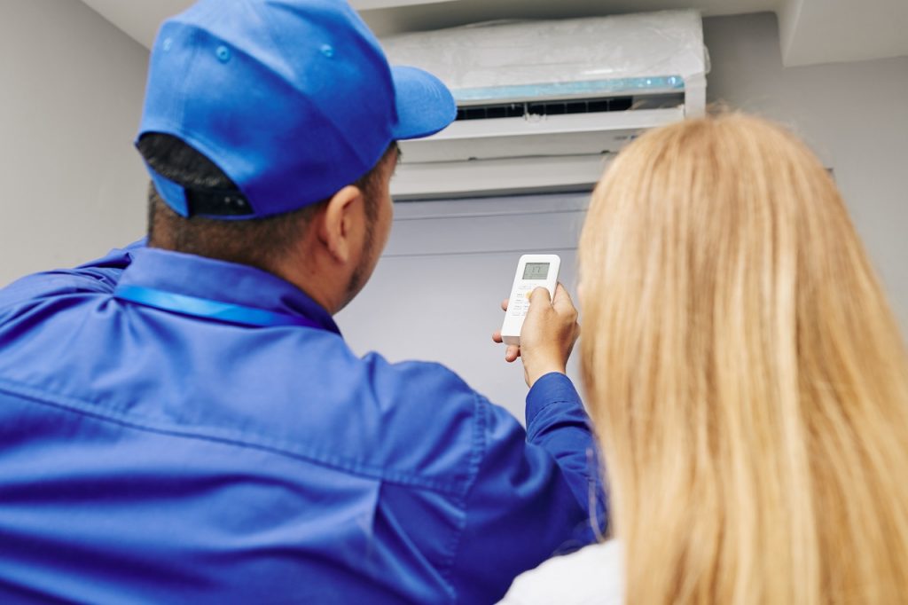 Service worker maintenance on aircon at home